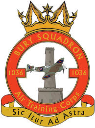 logo of bury 1036 squadron comprising of red circle with plane inside and gold crown and motto above and underneath
