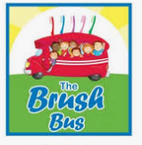 red bus on grass with children holding toothbrushes