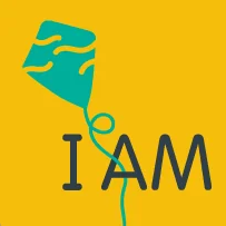 text logo comprising of I AM in black on yellow background with green kite