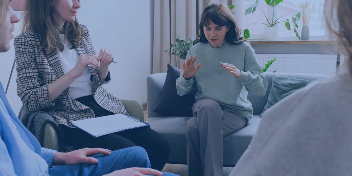 Support group with girl talking